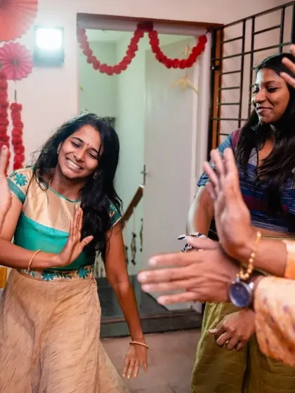 Dancing is pure bliss, and we believe anyone can do it. This shot captures the carefree joy of letting loose on the dance floor, something we encourage in all our events.