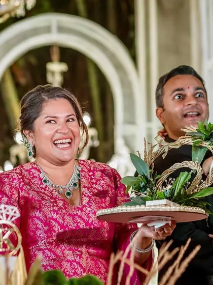 The groom's sister's hilarious and expressive reaction during the ring ceremony prank. A priceless candid shot.