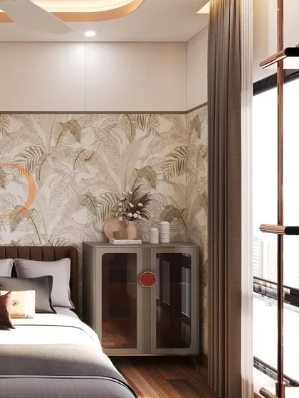 A modern bedroom with a botanical-patterned accent wall, a sleek grey cabinet, and large windows that fill the space with natural light.