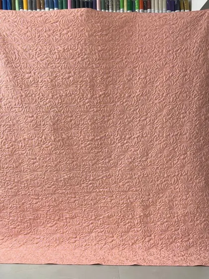 Another view of the beautiful texture on the wholecloth quilt.