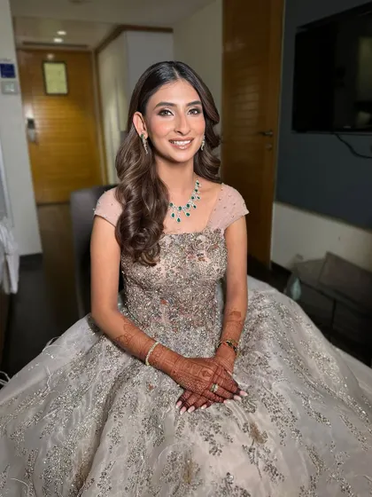 Effortless beauty for this bride's sangeet. I created a soft glam look with a focus on flawless skin and gentle contouring to complement her magnificent ball gown.