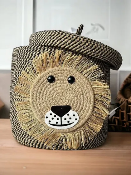 Our lion-themed laundry basket features a fringed mane for a fun, textural element. It's a stylish way to hide away laundry in a kid's room or bathroom.