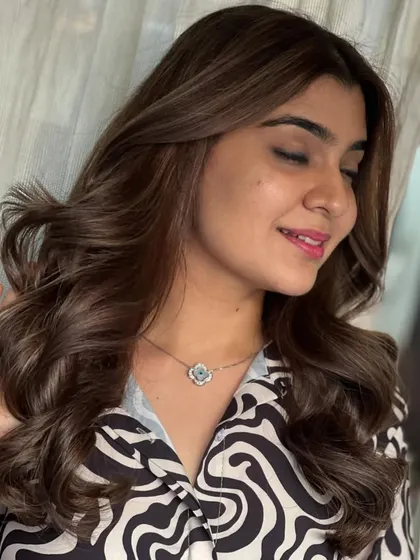 A close-up of the soft, flowing waves, showing off the beautiful blend of brown tones.