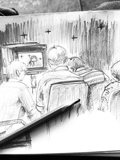 A quick sketch I made on set, capturing the collaborative energy of a shoot. This drawing shows the team gathered around the monitor, a moment that represents the teamwork behind every final image.
