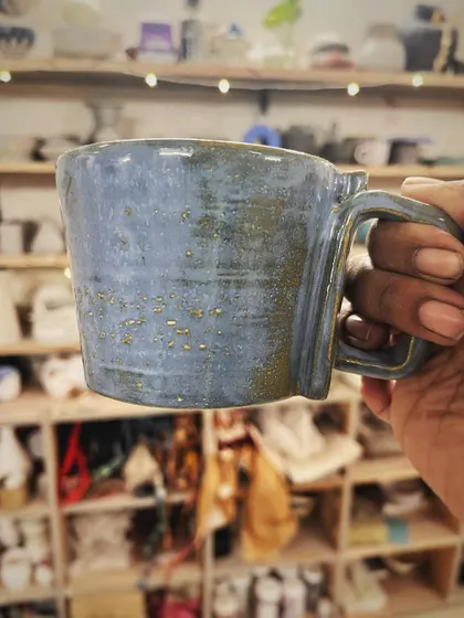This student created a wonderful variety of forms and textures in her beginner's course, from a marbled Nerikomi bowl to a textured mug with a unique handle.