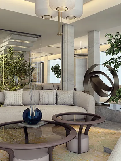 This living room in Indiabulls Sky Forest is designed for vertical living, with 3.6-meter ceilings and full-height windows framing expansive views. The neutral palette is thoughtfully restrained, allowing personal expression to take center stage.