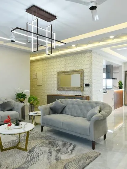 A duplicate of 215, this photo shows the completed living and dining area from a different angle, highlighting the polished marble floors and the seamless flow between the spaces.