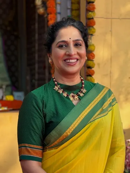 A beautiful portrait of Madhurani as Savitribai Phule. The makeup is subtle and respectful of the character, with a focus on creating a natural and timeless look.