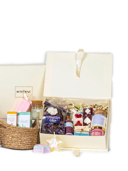 This image shows two of my most popular gifting options: a large, elegant hamper box and a rustic, reusable jute basket. Both can be filled with a custom selection of my handcrafted candles, soaps, and skincare products.