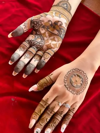 We offer a variety of designs for guests, including this beautiful combination of a lotus mandala on one hand and a floral vine on the other. It's a unique and stylish choice.