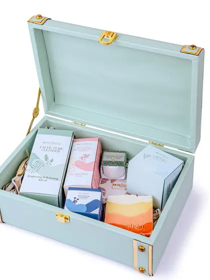My trunk boxes are a luxurious gifting option. This beautiful mint green trunk is filled with a variety of my skincare and bath products, creating a stunning and reusable gift that is sure to impress.