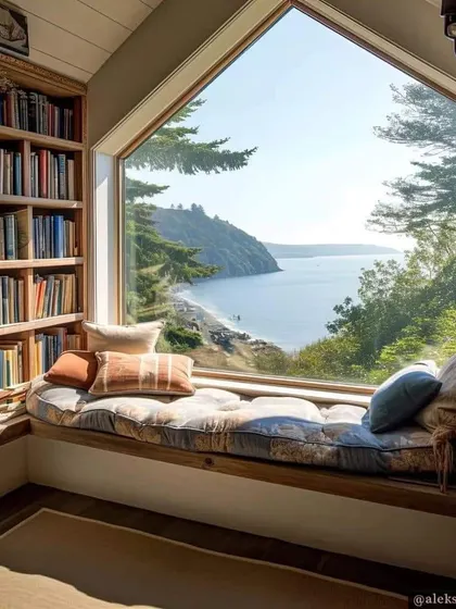This inspirational design shows a bay window transformed into a plush, comfortable daybed with a breathtaking view. I can create similar custom seating for any corner of your home.