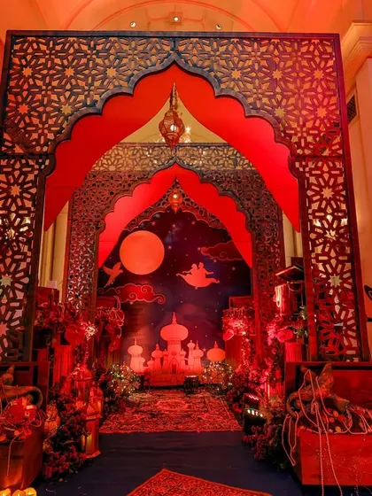 The full entranceway, showing how I used props like treasure chests and character cutouts of Jafar to build the complete story of Aladdin.