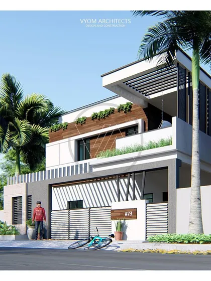Another view of the residence from image 57, this time highlighting the relationship with the landscape. The palm tree complements the tropical modernism feel of the architecture.