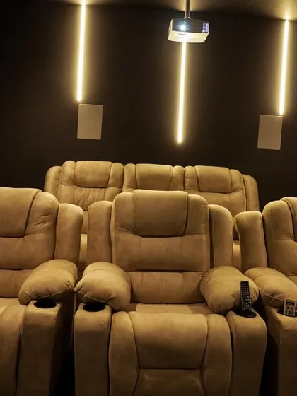 A head-on view of the seating, with the vertical LED lights creating a modern and stylish backdrop.