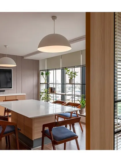 A private dining room within the IHCL office, featuring a custom table and chairs. The space can also be used for meetings, offering a flexible solution for the client's needs.