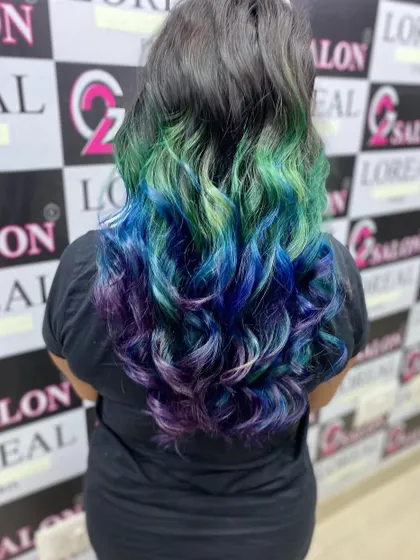 Don't be afraid to show your true colors. I specialize in vibrant, creative fashion hair coloring, blending shades like mermaid blue, green, and purple for a look that is uniquely you. Let's create something bold together.