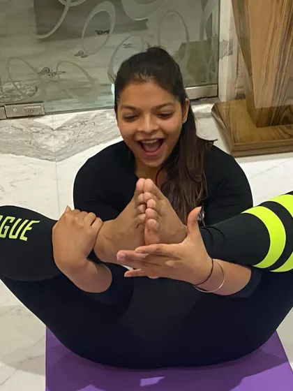 And here is my goofy side. Yoga is also about having fun and not taking yourself too seriously. This pose is all about joy and playfulness on the mat.