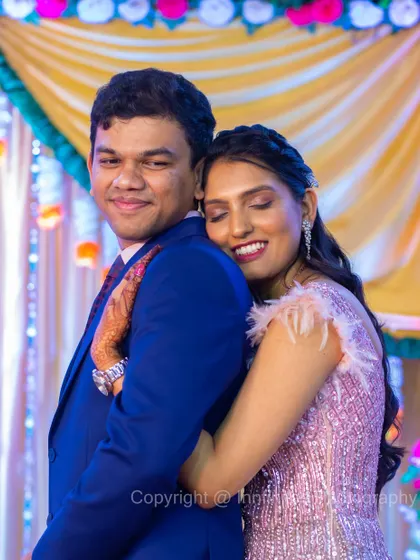 A warm, candid embrace between the couple during their engagement party. I look for these quiet, affectionate moments amidst the celebration.