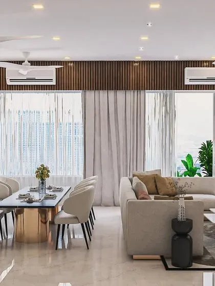 This expansive 2000 sq. ft. apartment in Andheri required a design that was both grand and intimate. I used a warm neutral palette and layered textures, like the wooden fluted paneling above the windows, to create a cohesive flow between the living and dining areas. The result is a contemporary and welcoming family home.