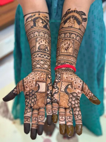 A unique design with a checkerboard pattern on the palms, surrounded by peacock and elephant motifs.