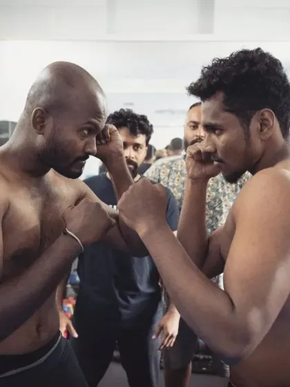 A close-up of the intense stare-down before the WBC qualifier. This is where you see a fighter's confidence.