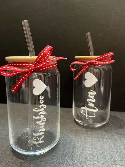 A pair of our can-shaped glass tumblers, personalised with names and a heart. They make a super cute gift for a couple or best friends.