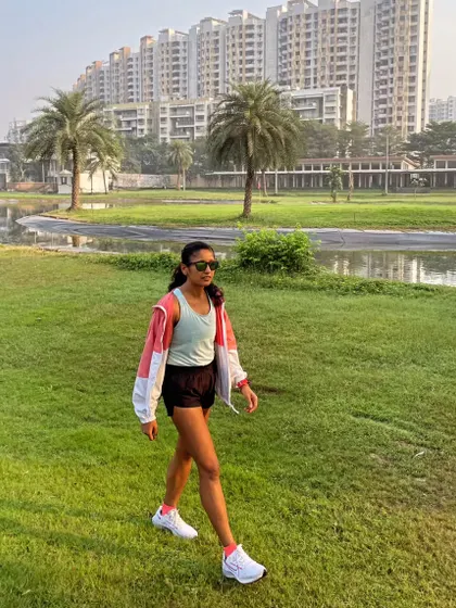 Once she realized she could achieve anything, she became unstoppable. A post-run walk, feeling the strength and confidence from a good workout.