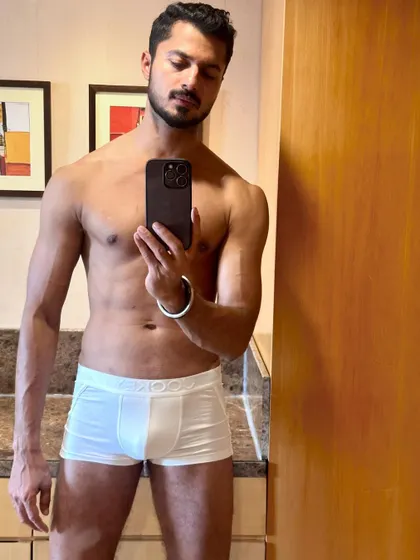 A full-torso shot in white underwear, a staple for fitness and underwear model castings.