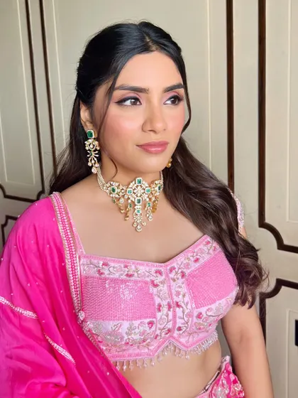 Another angle of this pretty-in-pink engagement style. The makeup is kept soft and glowing to let her natural beauty and the stunning jewellery shine.