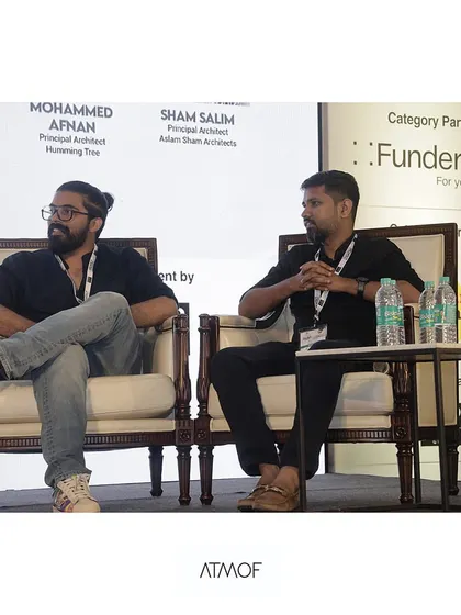 A candid moment from the Design Debate panel, sharing insights and ideas with fellow leading architects.
