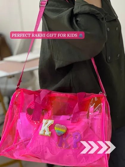 This bright pink jelly bag is the star of our kids' swim hamper. It's personalized with the child's initials and is perfect for carrying all their pool or beach day essentials.