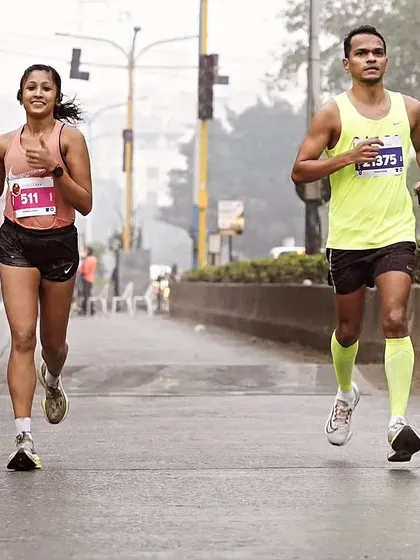Teamwork is dream work. Pacing my training partner during the Pune International Marathon. We support each other to achieve our best.