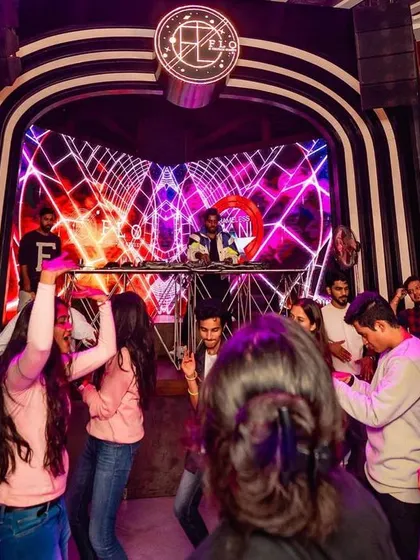 The crowd vibing to some trap music during a set with a fellow DJ. I love playing different genres and seeing how the energy on the dance floor shifts with the music.