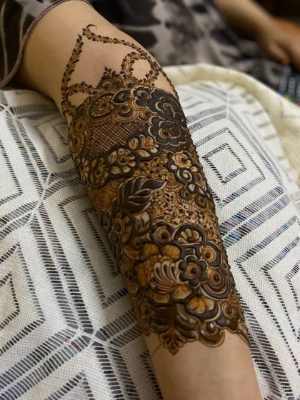 This is a detailed view of my intricate bridal henna work. Each design is unique, combining traditional patterns like paisleys and mandalas with fine-line fillers to create a stunning, full-coverage look for your special day.