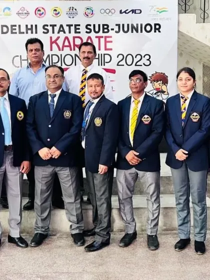 With the respected officials and my fellow referees at the Delhi State Championship. Organizing a successful and fair competition requires a dedicated team.