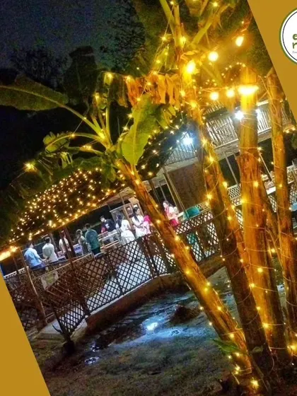 The farm transforms at night with fairy lights, creating a cozy and enchanting atmosphere for our evening events and dinners. It's the perfect escape from the city.