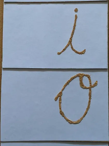 Feeling the shape of a letter before ever picking up a pencil is a key part of the Montessori approach to literacy. These handmade sandpaper letters connect the sensory experience of touch directly to the phonetic sound of the letter, creating a strong, multi-sensory pathway for learning to read and write.