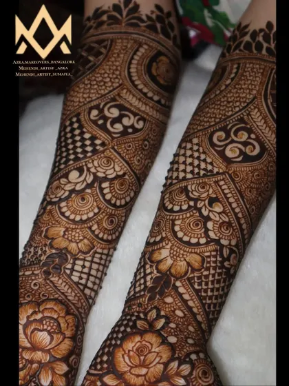A close-up of the arm portion of this intricate engagement mehendi.