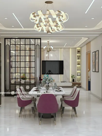 A grand dining space that opens into the living room. The statement chandelier and magenta chairs make the dining area a focal point, perfect for hosting lavish dinners.