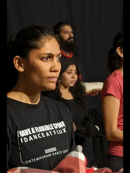 A performer's determined expression during a 'Sea's Fire' rehearsal. Our productions are driven by passion and purpose.