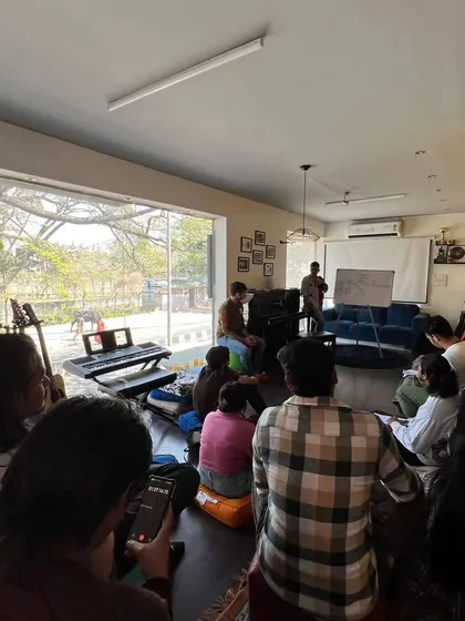 A wide shot of our music rights and distribution class, showing the interactive learning environment.