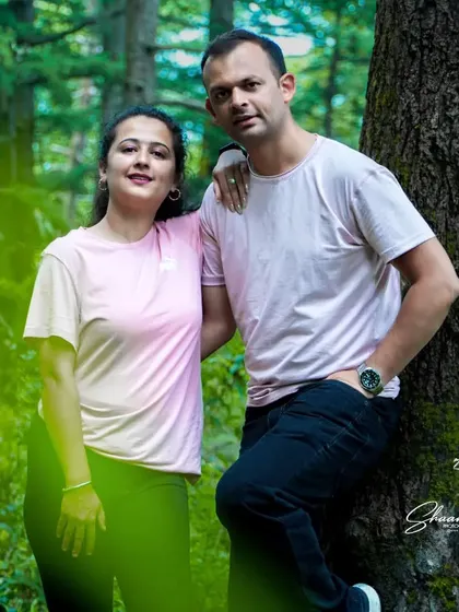 A relaxed couple's portrait in casual outfits. Pre-wedding shoots can have multiple looks, from formal to everyday, to tell a more complete story.