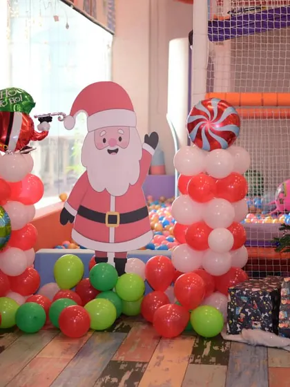 Our play zone transformed into a winter wonderland for Christmas. The festive decor, including a Christmas tree and Santa cutouts, set the perfect mood for our holiday carnival.