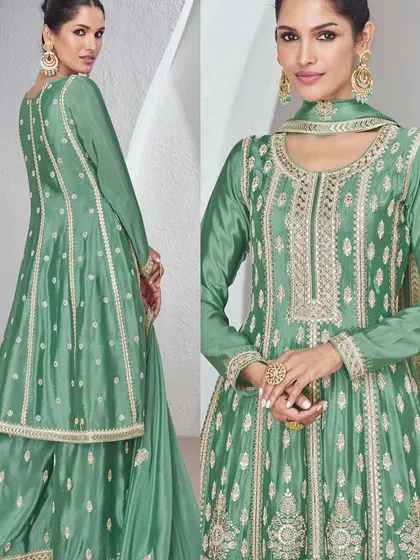 This green Chinon silk palazzo suit is all about sophisticated charm. The top has heavy thread embroidery, and the flowy palazzo pants make it super comfortable yet dressy.