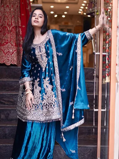 Regal splendor! Wrap yourself in the opulence of this blue velvet embroidered suit, meticulously crafted to make you shine.