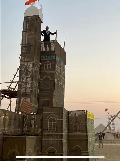 Standing atop the replica of a fort tower, part of the grand entrance I designed for the Maharashtra state exhibit at the National Jamboree.