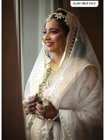 A candid moment of our beautiful bride Sarah. Her graceful smile and the soft lighting capture the serene and happy feeling of her Nikah day.