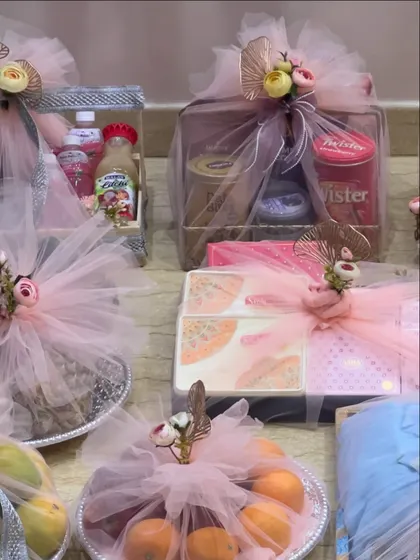 Another angle of the trousseau packing, highlighting the different shapes and sizes of gifts I handle. Each item is carefully wrapped to be both secure and visually appealing.
