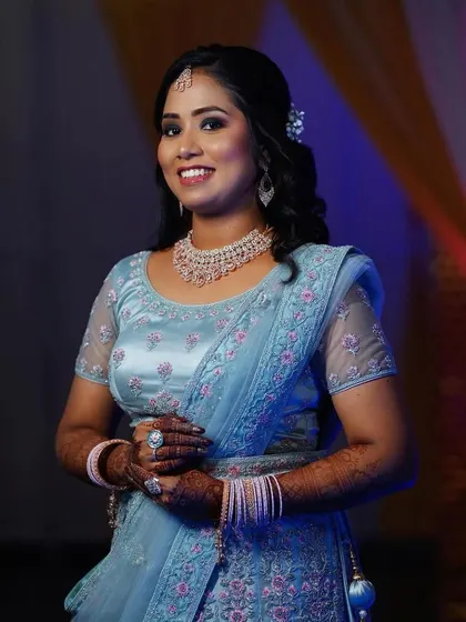 A collection of my brides looking stunning for their reception, sangeet, and cocktail parties. Each look is customized to match their outfit and personality.